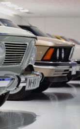 selective focus photography of assorted-color vehicles